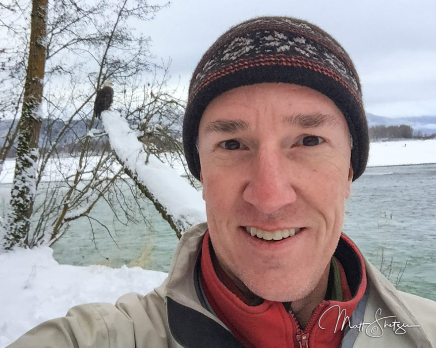 A friendly eagle poses with Matt on the Chilkat river, Alaska